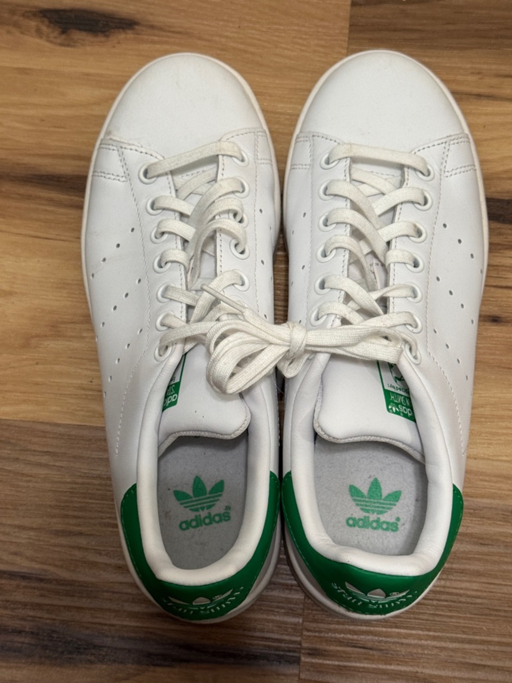 Adidas White Sneakers with Green Heel Accents. Mens size 6.5 Women’s 8-8.5